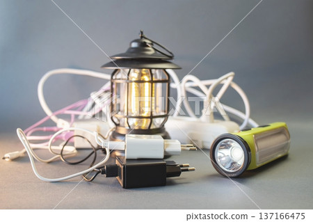 Portable solutions for power and lighting in emergency situations: lanterns, flashlights, power banks and external batteries 137166475