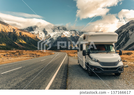 Motorhome parked on roadside with Mount Cook over road in autumn at New Zealand Motorhome parked on roadside with Mount Cook over road in autumn at New Zealand 137166617