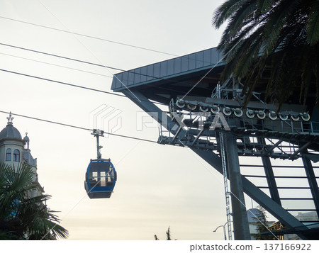 Lift to the mountain. Cable car mechanism.  A place visited by tourists. 137166922