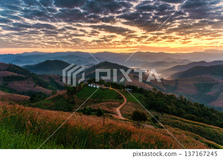 Sunrise shines over mountain with homestay during harvest at Mae Jam Sunrise shines over mountain with homestay during harvest at Mae Jam 137167245