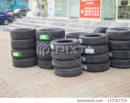 Shop selling car tires. Spare parts sales business. Rubber tires. The concept of changing tires. 137167739