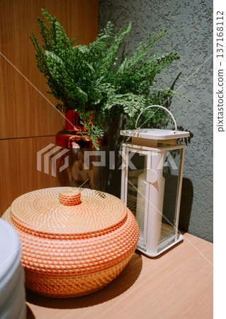Cozy Interior Decoration with Green Plant and Woven Basket Cozy Interior Decoration with Green Plant and Woven Basket 137168112