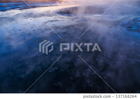 A magical blue moment created by steam, fog and ice on a cold winter morning on the Tokachi River A magical blue moment created by steam, fog and ice on a cold winter morning on the Tokachi River 137168264