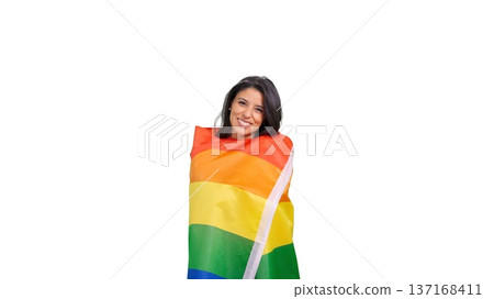 Woman smiling wrapped in rainbow pride flag celebrating support 137168411