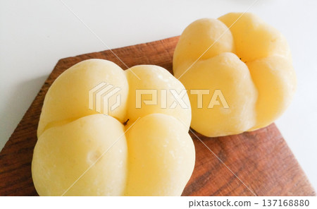 Chaenomeles japonica frozen on a wooden board. Chaenomeles japonica frozen on a wooden board. 137168880