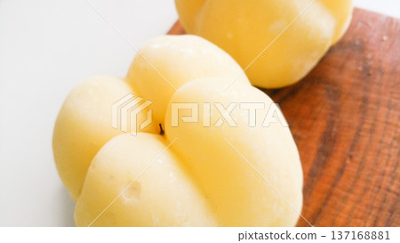 Chaenomeles japonica frozen on a wooden board. Chaenomeles japonica frozen on a wooden board. 137168881