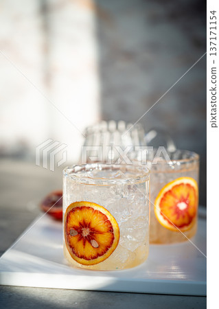Cold water with red orange Cold water with red orange 137171154