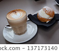 Maritozzo Cream Bun with Latte Art Heart in Cozy Cafe in Rome, Italy 137173140