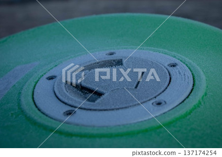 Frost on a winter morning: The texture of the frozen fuel tank cap Frost on a winter morning: The texture of the frozen fuel tank cap 137174254