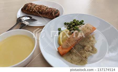 Sautéed salmon on a bright dining table Sautéed salmon on a bright dining table 137174514