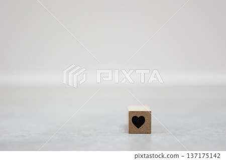 Heart-shaped wooden blocks. A symbol of love. Heart-shaped wooden blocks. A symbol of love. 137175142