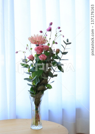 A flower in a vase A flower in a vase 137176163
