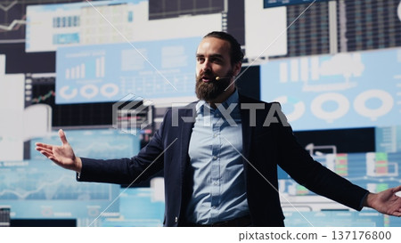 Public speaker CEO hosting business presentation to share a vision, discuss about new growth strategy and ideas for global development. Using a hands free microphone for attendees. Camera A. Public speaker CEO hosting business presentation to share a vision, discuss about new growth strategy and ideas for global development. Using a hands free microphone for attendees. Camera A. 137176800