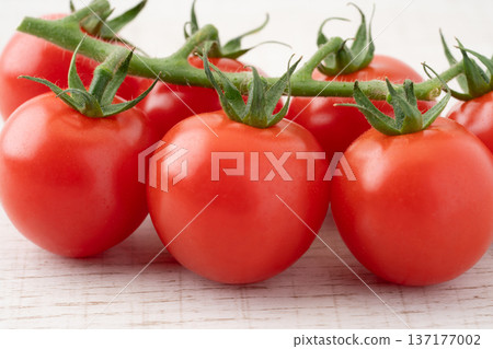 Close-up of fresh cherry tomatoes Close-up of fresh cherry tomatoes 137177002