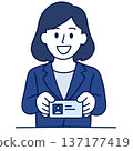 Female employee handing over business card 137177419