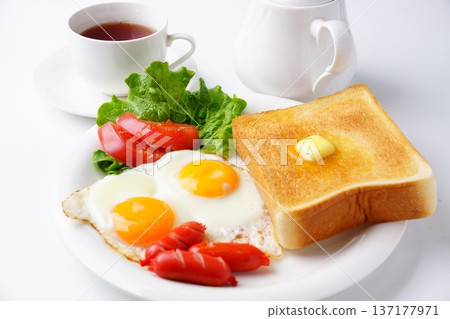 Breakfast: toast and fried eggs Breakfast: toast and fried eggs 137177971