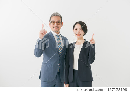 A pointing businessman A pointing businessman 137178198