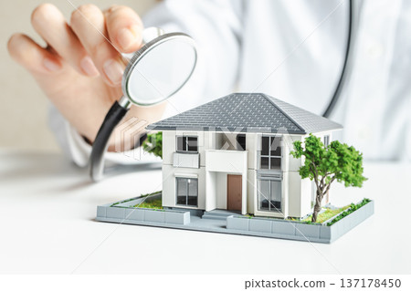 House model and stethoscope - Image material for real estate value and home diagnosis House model and stethoscope - Image material for real estate value and home diagnosis 137178450