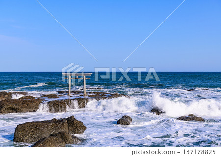 The sacred torii gate standing in the sea at Oarai Isosaki Shrine The sacred torii gate standing in the sea at Oarai Isosaki Shrine 137178825