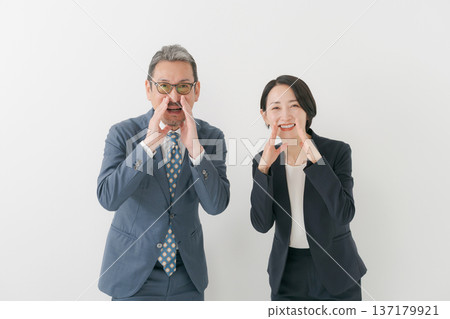 Men and women in suits cheering Men and women in suits cheering 137179921