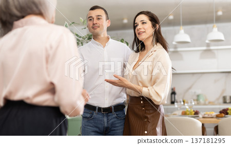 Adult daughter introduces parents to her boyfriend, family gatherings and communication Adult daughter introduces parents to her boyfriend, family gatherings and communication 137181295