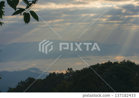 sunrise with moving of cloud and clear sky and layer of mountain sunrise with moving of cloud and clear sky and layer of mountain 137182433