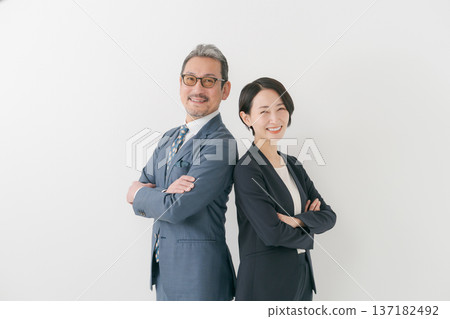 Two businessmen with their arms folded 137182492
