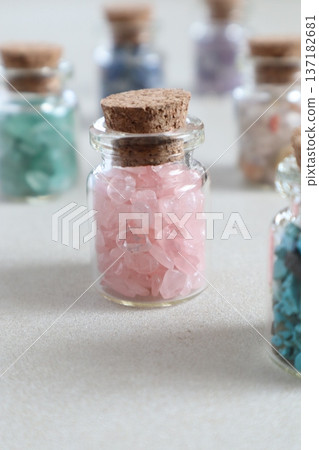 Colorful natural stones in a bottle Colorful natural stones in a bottle 137182681