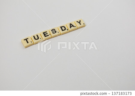 Celebration of National Scrabble Day with the word Tuesday on the board 137183173