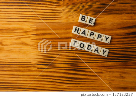 Celebrate National Scrabble Day with words on wooden table Celebrate National Scrabble Day with words on wooden table 137183237
