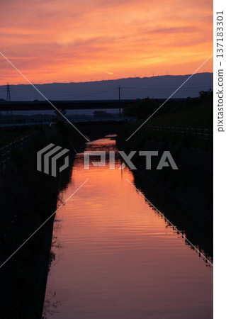 Sunset on the surface of the water Sunset on the surface of the water 137183301