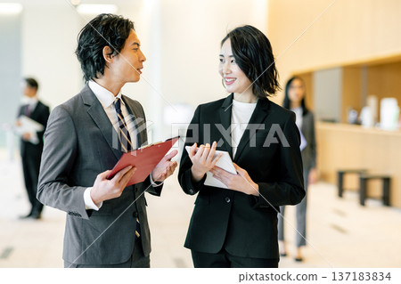 Business people lining up in the office Business people lining up in the office 137183834