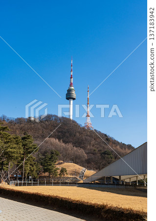 N Seoul Tower with autumn landscape. It is also known as Namsan Tower or Seoul Tower, the landmark which is a communication and observation tower located on Nam Mountain in central Seoul, South Korea N Seoul Tower with autumn landscape. It is also known as Namsan Tower or Seoul Tower, the landmark which is a communication and observation tower located on Nam Mountain in central Seoul, South Korea 137183942