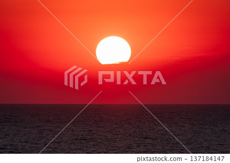 Beautiful red and orange sunrise over the sea. 137184147
