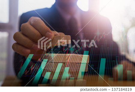 Stock market or forex trading graph and candlestick chart suitable for financial investment concept. Economy trends background for business idea and all art work design. Abstract finance background. Stock market or forex trading graph and candlestick chart suitable for financial investment concept. Economy trends background for business idea and all art work design. Abstract finance background. 137184819