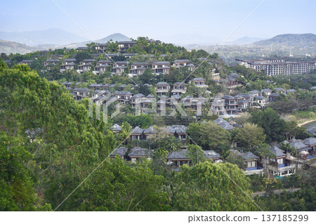 Aerial view of a bungalow on a mountainside near Sanya city on Hainan Island in China 137185299
