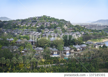 Aerial view of a bungalow on a mountainside near Sanya city on Hainan Island in China 137185301