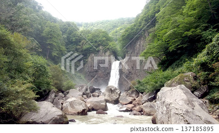Naena Falls shining in the summer sunshine Naena Falls shining in the summer sunshine 137185895