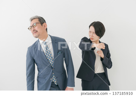 Middle-aged man being punched Middle-aged man being punched 137185910