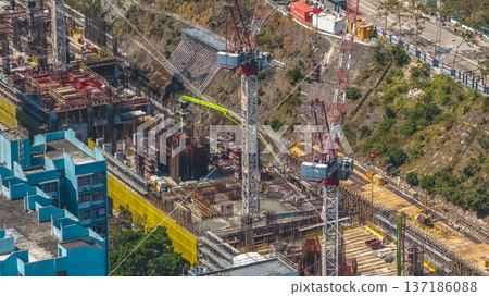 Active Construction Cranes Overlook Expanding Pak Tin Estate Redevelopment Feb 13 2026 Active Construction Cranes Overlook Expanding Pak Tin Estate Redevelopment Feb 13 2026 137186088
