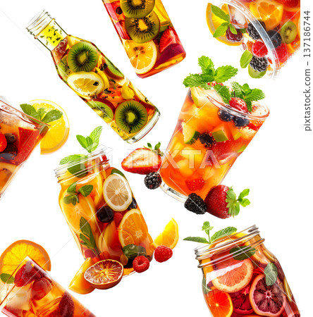 Assorted tea fruity beverages in glass containers isolated on white background, expressing a refreshing drink concept 137186744