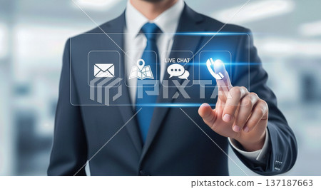 Businessman hand touching virtual phone icon on digital interface screen with contact options representing customer support and communication technology service 137187663