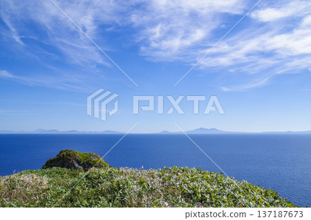 Kunashiri Island seen from Shiretoko Whale Viewing Hill Park Kunashiri Island seen from Shiretoko Whale Viewing Hill Park 137187673