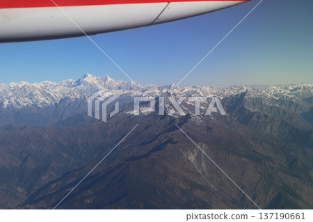 Himalayan mountain ranges seen from inside a mountain flight Himalayan mountain ranges seen from inside a mountain flight 137190661