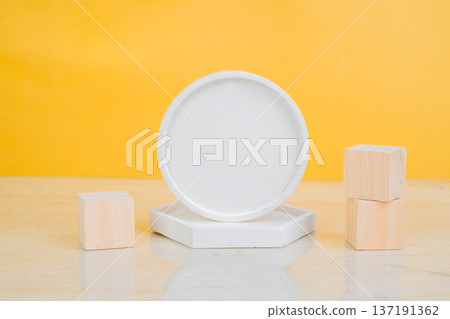 Cylindrical podium with leaves for branding and packaging presentation. Beauty product concept. Cylindrical podium with leaves for branding and packaging presentation. Beauty product concept. 137191362