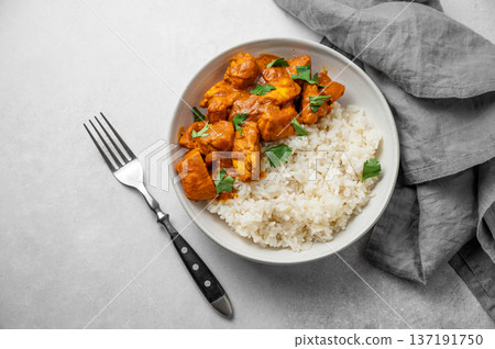 Chicken tikka masala curry with rice on marble background Chicken tikka masala curry with rice on marble background 137191750