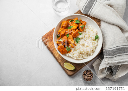 Chicken tikka masala curry with rice on marble background Chicken tikka masala curry with rice on marble background 137191751