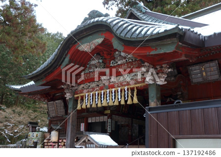 Kitaguchi Hongu Sengen Jinja Shrine in Fujiyoshida of Yamanashi Japan during the winter. This is the traditional Shinto entrance to the path to the summit of Mt. Fuji, and dates from the year 100AD 137192486