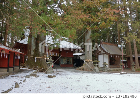Kitaguchi Hongu Sengen Jinja Shrine in Fujiyoshida of Yamanashi Japan during the winter. This is the traditional Shinto entrance to the path to the summit of Mt. Fuji, and dates from the year 100AD Kitaguchi Hongu Sengen Jinja Shrine in Fujiyoshida of Yamanashi Japan during the winter. This is the traditional Shinto entrance to the path to the summit of Mt. Fuji, and dates from the year 100AD 137192496
