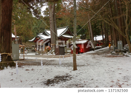 Kitaguchi Hongu Sengen Jinja Shrine in Fujiyoshida of Yamanashi Japan during the winter. This is the traditional Shinto entrance to the path to the summit of Mt. Fuji, and dates from the year 100AD Kitaguchi Hongu Sengen Jinja Shrine in Fujiyoshida of Yamanashi Japan during the winter. This is the traditional Shinto entrance to the path to the summit of Mt. Fuji, and dates from the year 100AD 137192500
